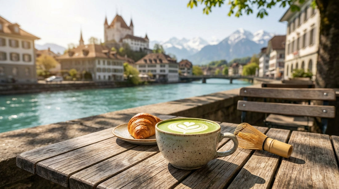 Here is a detailed image description designed for a generative AI (like Midjourney, DALL-E 3, or Stable Diffusion) to create the perfect blog header.

### Image Concept: "The Alpine Matcha Moment"

**Visual Strategy:**
The goal is to blend the specific pr